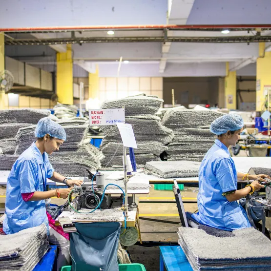 women_factory_workers_rug_sewing