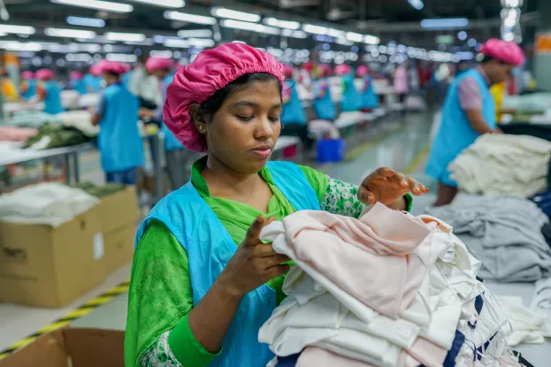 woman_sorting_clothes_in_factory